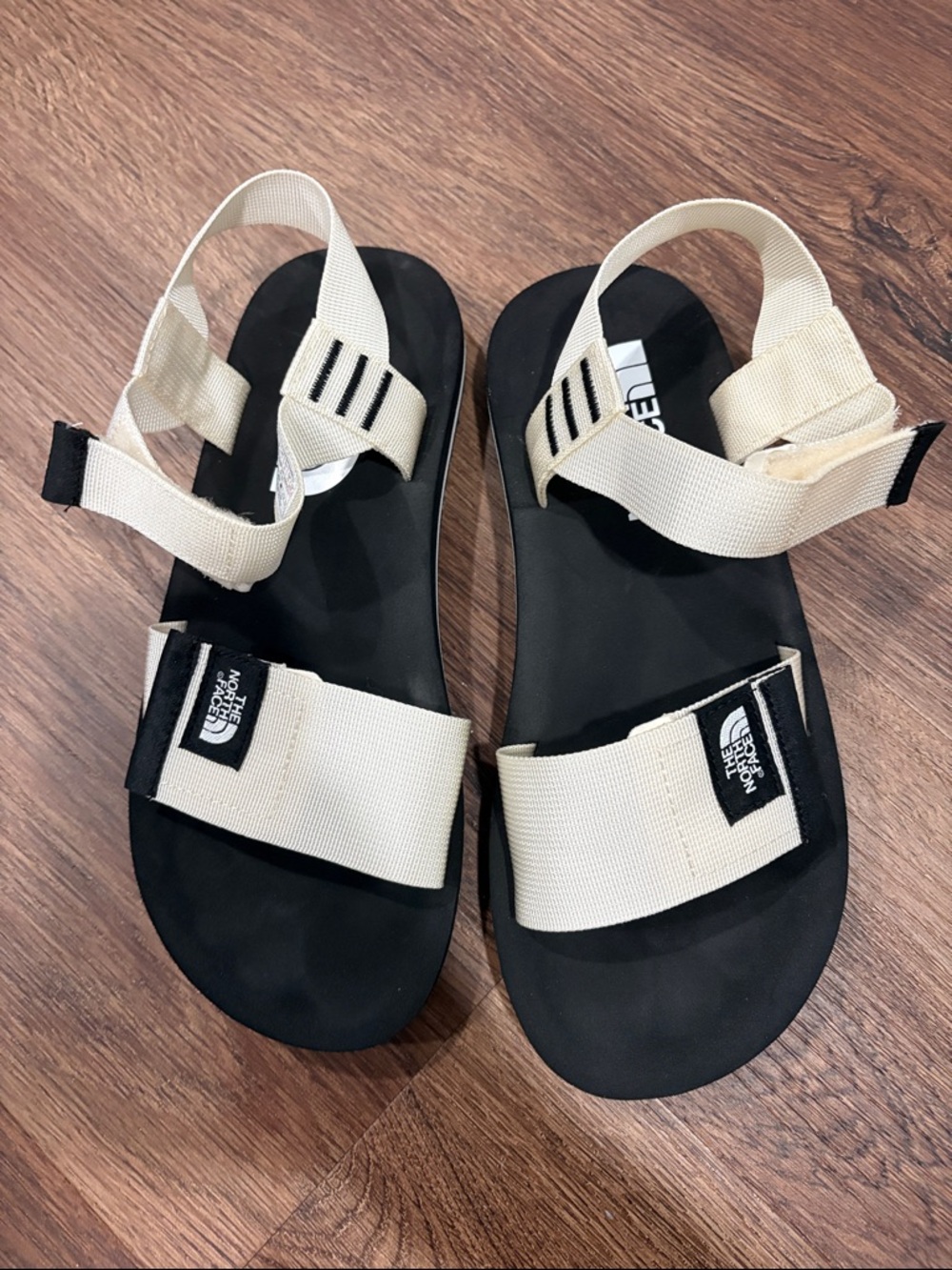 The North Face Cream Strap Sandals with Black Footbed